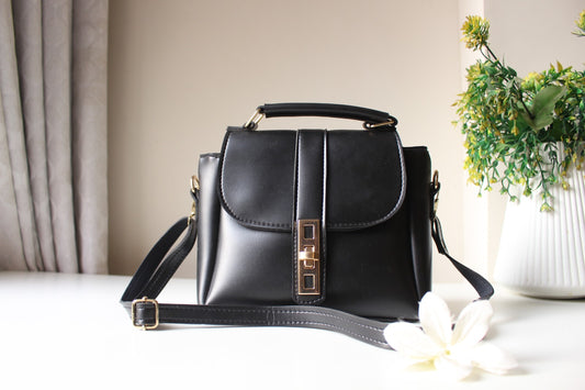 SIGNATURE ELLIPSE BAG