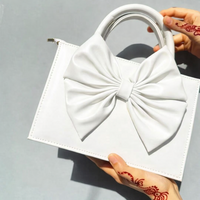 SIGNATURE BOW BAG | WHITE BOW