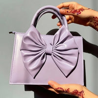 SIGNATURE BOW BAG | PURPLE BOW