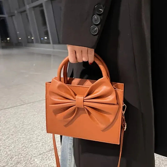 SIGNATURE BOW BAG | Brown