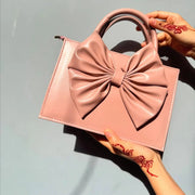 SIGNATURE BOW BAG | TEA PINK BOW